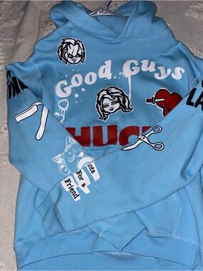 Light Blue Graphic Child’s Play Pullover Hoodie with 'Good Guys' Print
